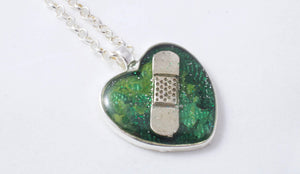 Green Organ Donation Bandaid Necklace - Jenny Bagwill Art