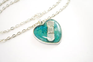 Teal Bandaid Necklace - Jenny Bagwill Art